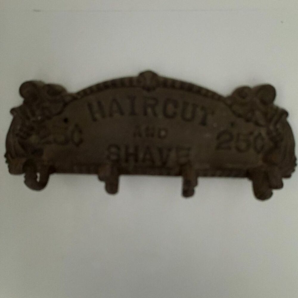 vtg cast iron "haircut and Shave 25 cents" wall hook